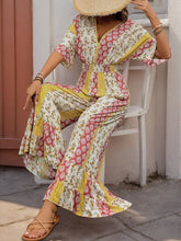 Perfee Ruffled Hem Printed V-Neck Jumpsuit OutfitFlow